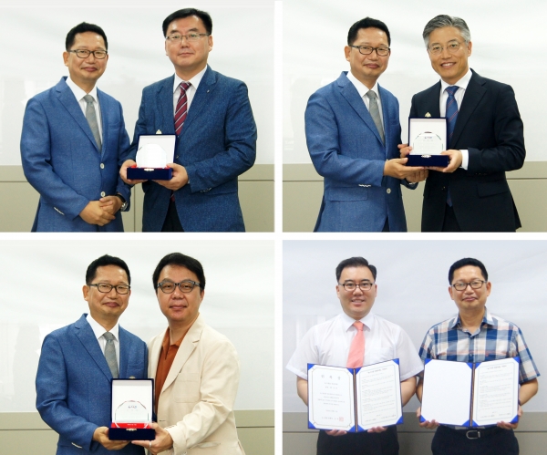 김영조 발행인이 이효상 교수(좌상측), 박재경 소장(우상측), 홍성호 교수(좌하측), 이강석 대표(우하측)에게 위촉장과 위촉패를 전달하고 있다.